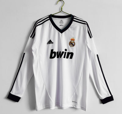 a soccer jersey hanging on a hanger