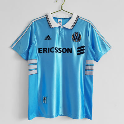 a soccer jersey hanging on a hanger