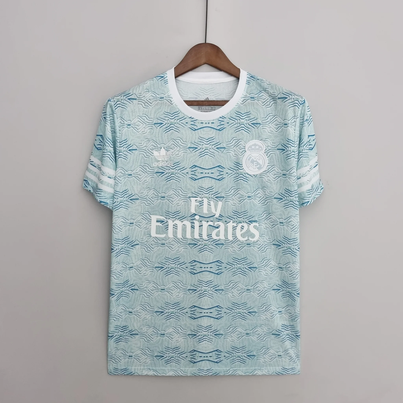 a soccer jersey hanging on a hanger