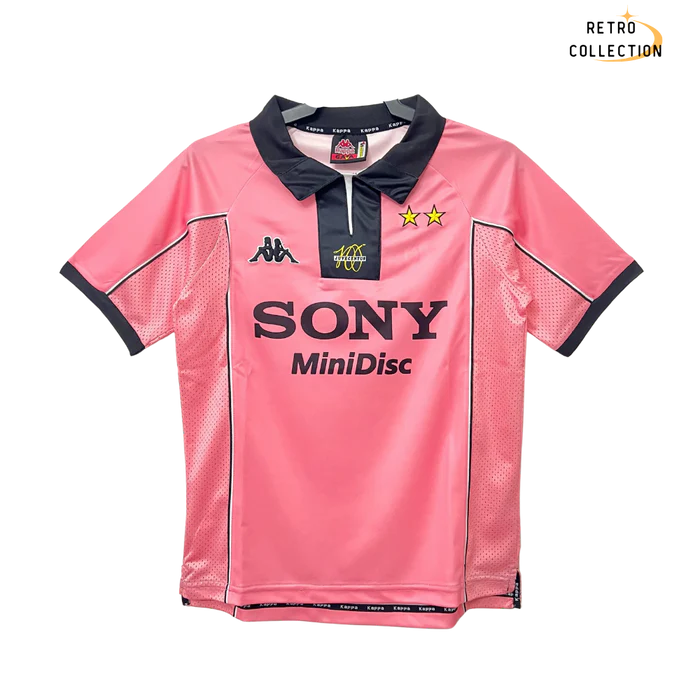 a pink jersey with a black collar and white collar