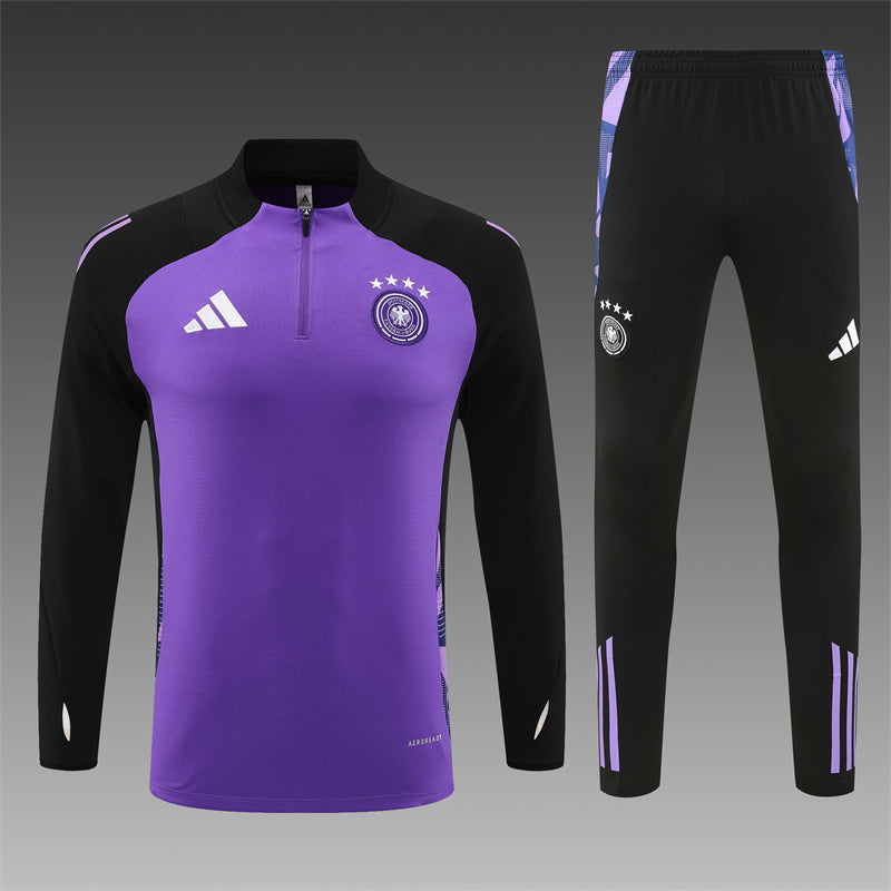 a purple and black soccer uniform is shown