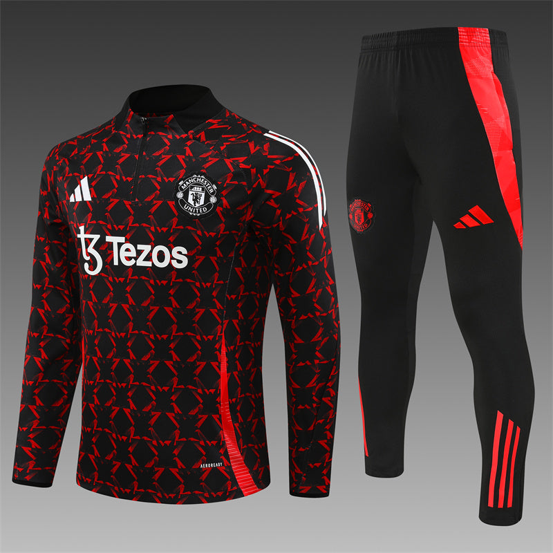 a black and red soccer jersey and pants