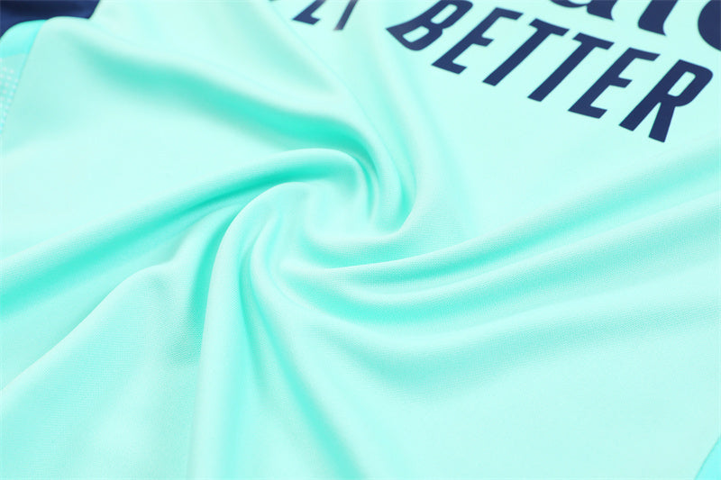 a close up of a soccer jersey with a blue background