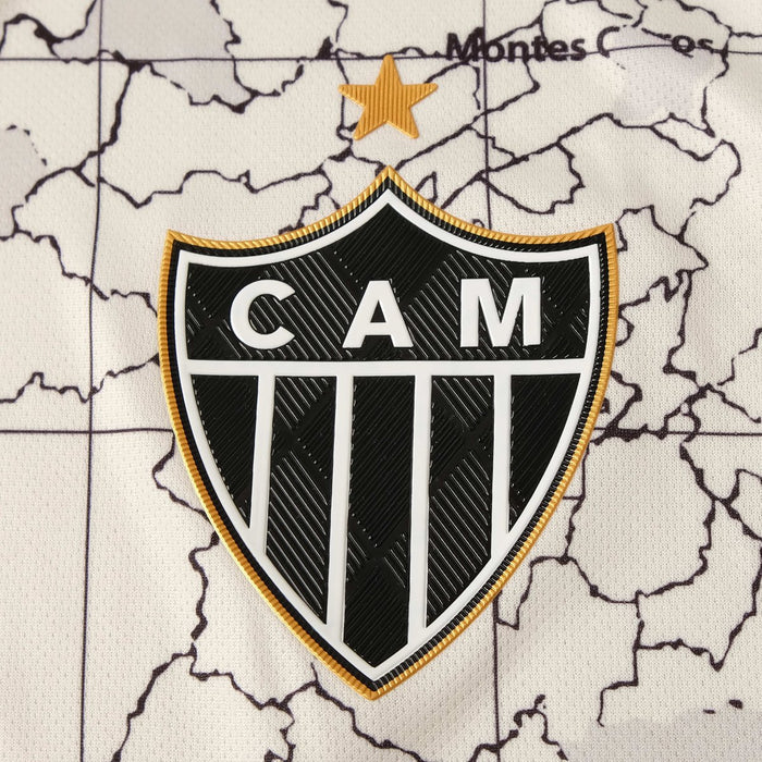 a black and white soccer jersey with the word cam on it