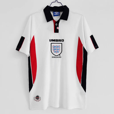 a white shirt with a black and red stripe